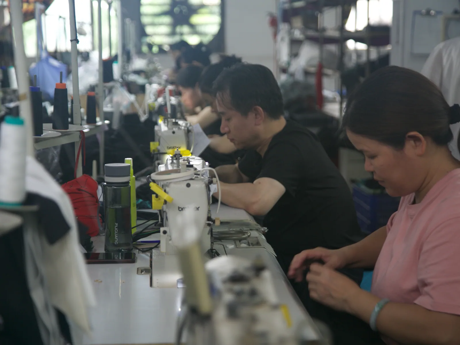 PIPK sewing production line with operators at machines