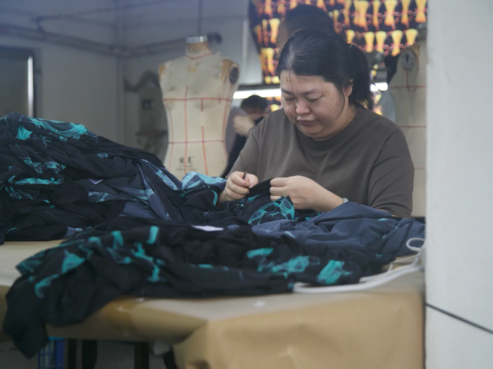 PIPK garment hand-finishing work